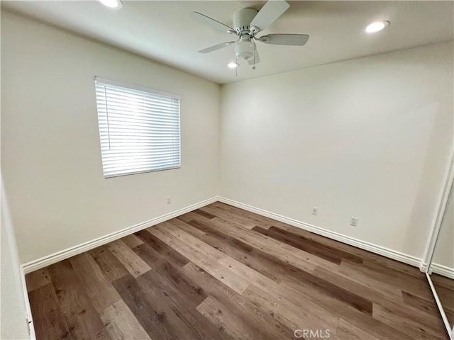 spare room with recessed lighting, baseboards, and ceiling fan