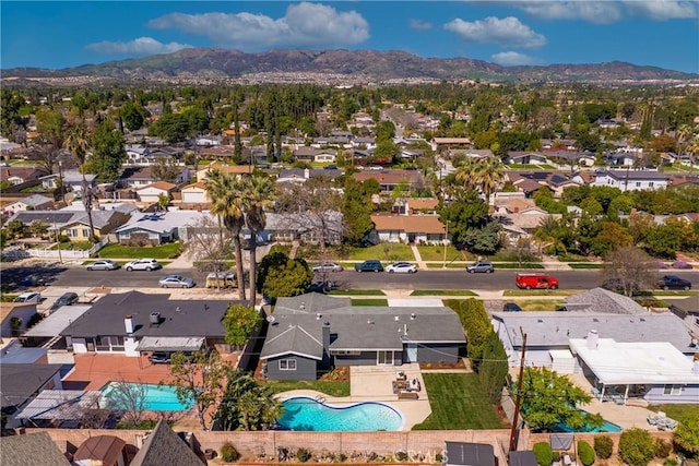 birds eye view of property featuring a residential view and a mountain view