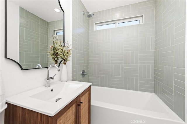 full bathroom featuring vanity and shower / bathtub combination