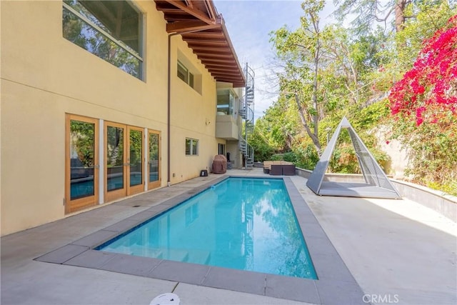 712 Orange Grove Ter, South Pasadena, CA 91030 - outdoor pool with stairs, a patio area, and an outdoor living space