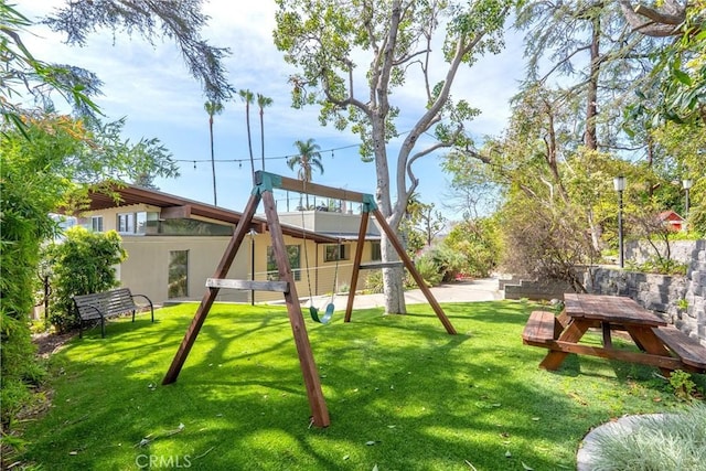 712 Orange Grove Ter, South Pasadena, CA 91030 - view of playground featuring a lawn