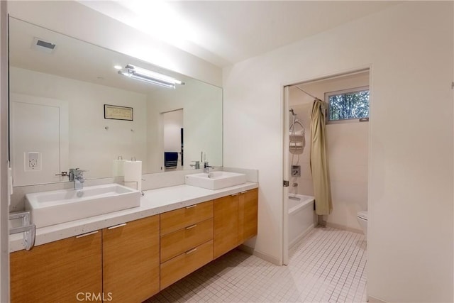712 Orange Grove Ter, South Pasadena, CA 91030 - bathroom with toilet, shower / tub combo with curtain, double vanity, and tile patterned floors