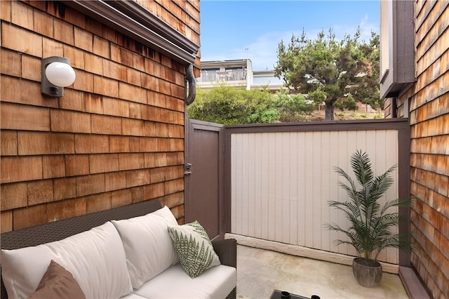 view of patio / terrace with fence