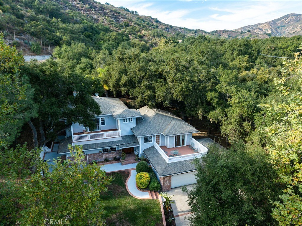 19731 Live Oak Canyon Rd, Trabuco Canyon, CA 92679 - bird's eye view featuring a wooded view and a mountain view