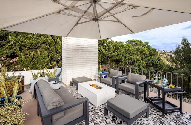 7031 Estrella De Mar Rd, Carlsbad, CA 92009 - view of patio / terrace featuring an outdoor living space with a fire pit