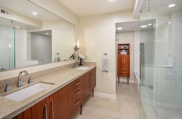 7031 Estrella De Mar Rd, Carlsbad, CA 92009 - bathroom featuring tiled shower, double vanity, baseboards, and recessed lighting