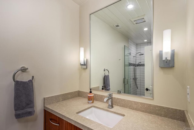 7031 Estrella De Mar Rd, Carlsbad, CA 92009 - bathroom with recessed lighting, vanity, and a shower stall