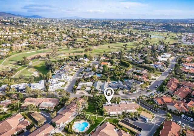 7031 Estrella De Mar Rd, Carlsbad, CA 92009 - aerial view of property's location with a local golf course, a mountainous background, and nearby suburban area