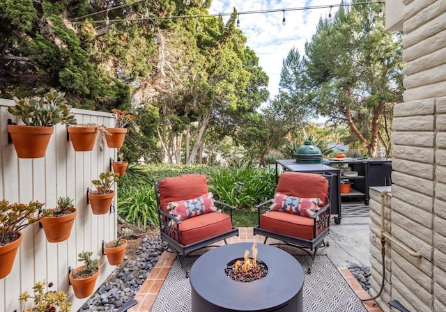 7031 Estrella De Mar Rd, Carlsbad, CA 92009 - view of patio / terrace featuring a fire pit