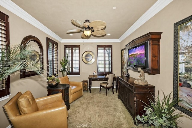 sitting room with light carpet, ornamental molding, recessed lighting, and ceiling fan