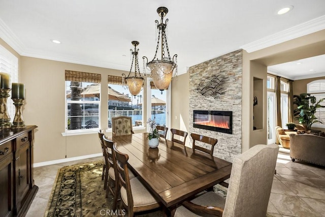 dining space with light tile patterned flooring, a stone fireplace, ornamental molding, and recessed lighting