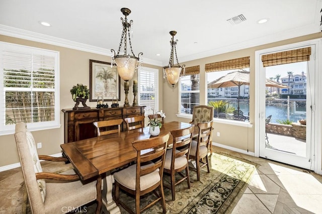 dining area featuring baseboards, visible vents, recessed lighting, and ornamental molding