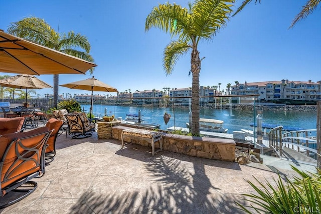 view of patio / terrace featuring a water view