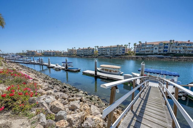 view of dock with a water view
