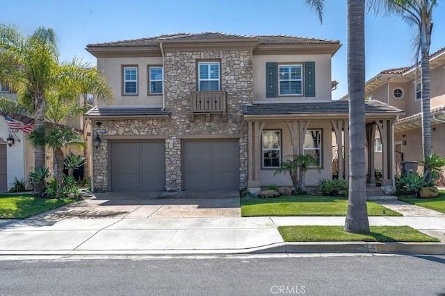view of front of property featuring driveway, stone siding, a tiled roof, a garage, and stucco siding
