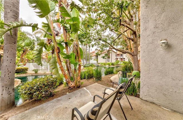 view of patio / terrace with fence
