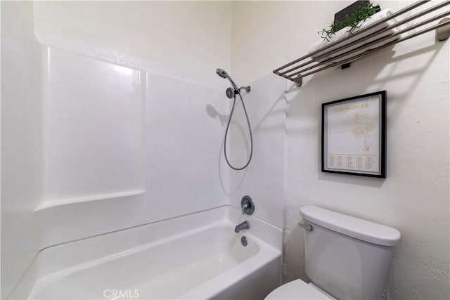 full bathroom featuring toilet and shower / washtub combination