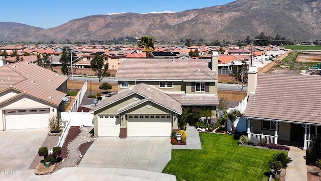 exterior space with a mountain view and a residential view