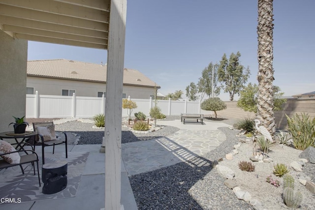 view of patio with a fenced backyard