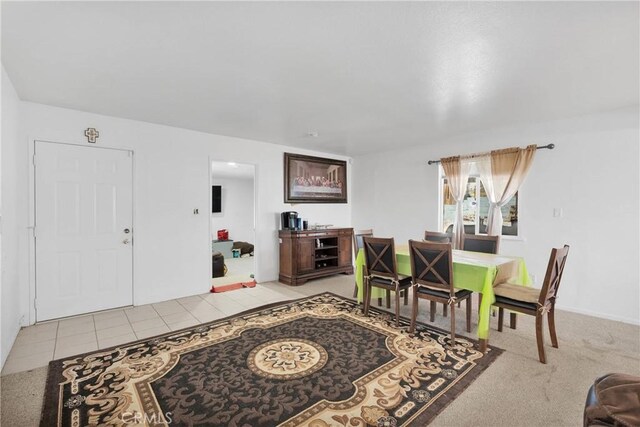 929 E Elizabeth St, Barstow, CA 92311 - living room featuring light tile patterned floors
