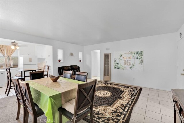 929 E Elizabeth St, Barstow, CA 92311 - dining room featuring light tile patterned flooring and a ceiling fan