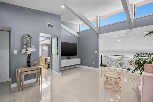 10 Stagecoach Rd, Bell Canyon, CA 91307 - living room with a high ceiling, tile patterned flooring, baseboards, and visible vents