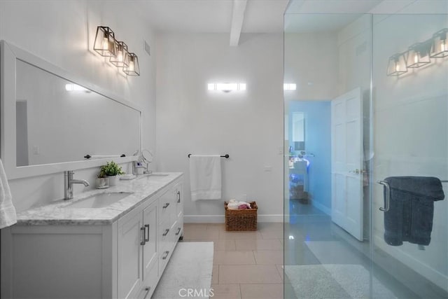 10 Stagecoach Rd, Bell Canyon, CA 91307 - full bathroom featuring a shower stall, baseboards, tile patterned floors, beam ceiling, and a sink