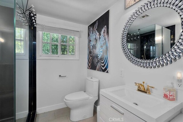 10 Stagecoach Rd, Bell Canyon, CA 91307 - full bathroom with a shower, tile patterned flooring, vanity, toilet, and baseboards