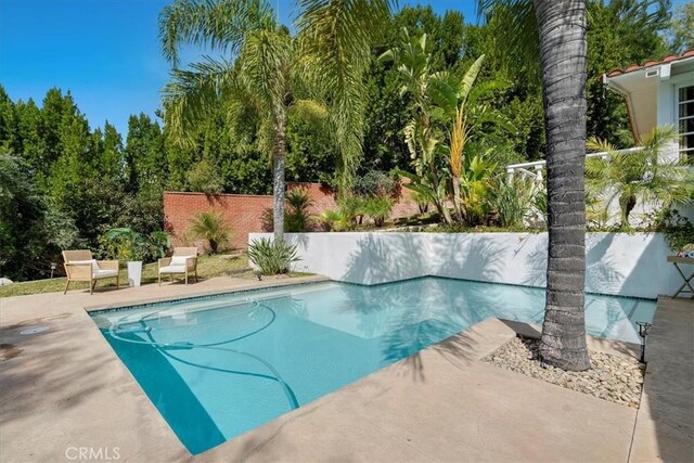 10 Stagecoach Rd, Bell Canyon, CA 91307 - view of pool with a patio, a fenced in pool, and fence