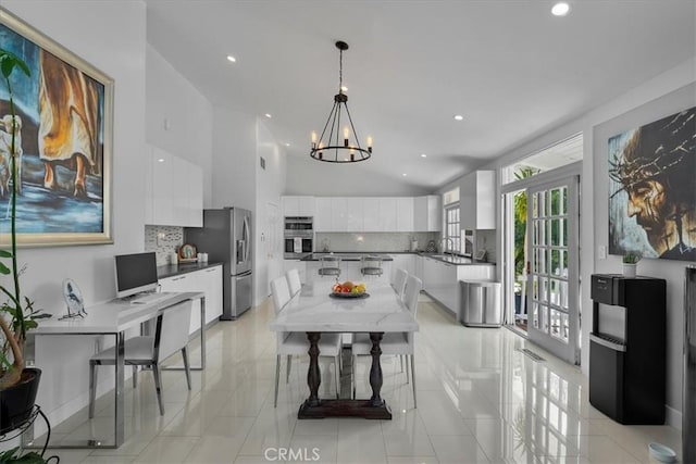 10 Stagecoach Rd, Bell Canyon, CA 91307 - kitchen with white cabinets, a chandelier, modern cabinets, stainless steel appliances, and tasteful backsplash