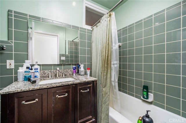 3540 Watkins Dr, Riverside, CA 92507 - bathroom with vanity and shower / tub combo