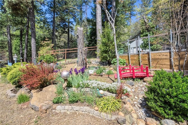 view of yard with fence