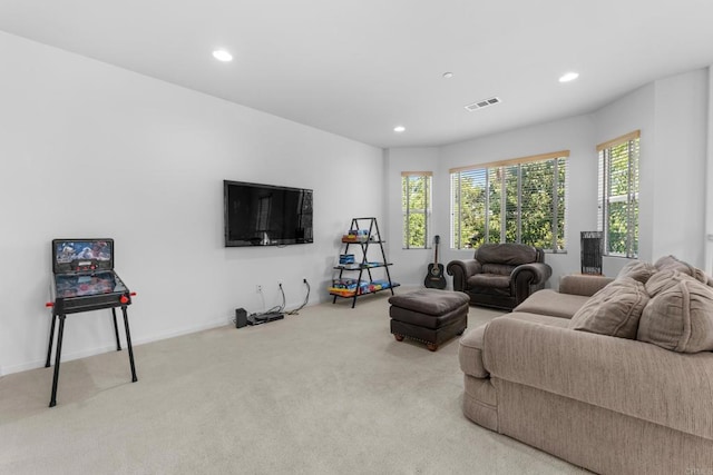 carpeted living room with baseboards, visible vents, and recessed lighting