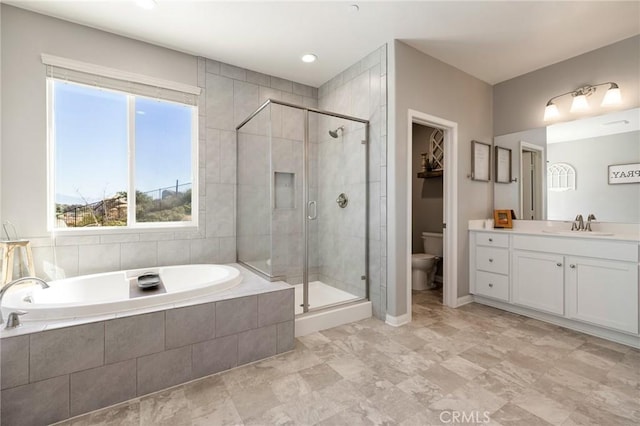 30688 Lone Pine Dr, Menifee, CA 92584 - full bath featuring a garden tub, toilet, a stall shower, vanity, and baseboards