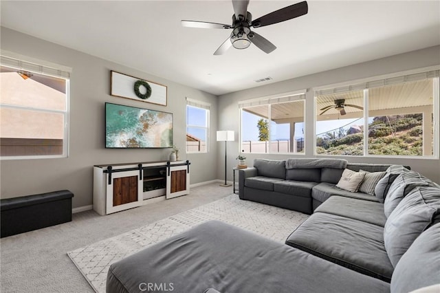 30688 Lone Pine Dr, Menifee, CA 92584 - living area featuring light colored carpet, a ceiling fan, and baseboards