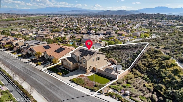 30688 Lone Pine Dr, Menifee, CA 92584 - aerial perspective of suburban area with a mountain backdrop and property boundaries highlighted