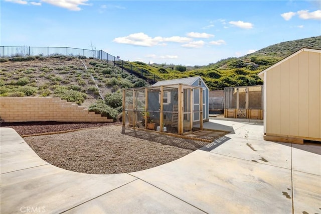 30688 Lone Pine Dr, Menifee, CA 92584 - fenced backyard featuring exterior structure and an outbuilding