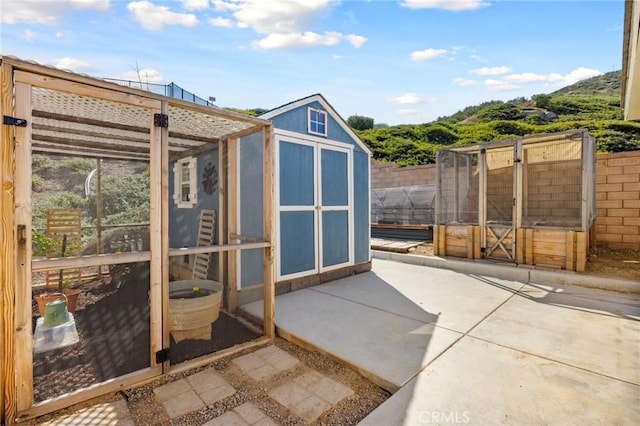 30688 Lone Pine Dr, Menifee, CA 92584 - view of shed with a fenced backyard