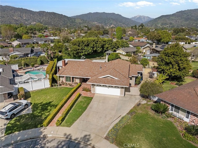 bird's eye view with a residential view and a mountain view