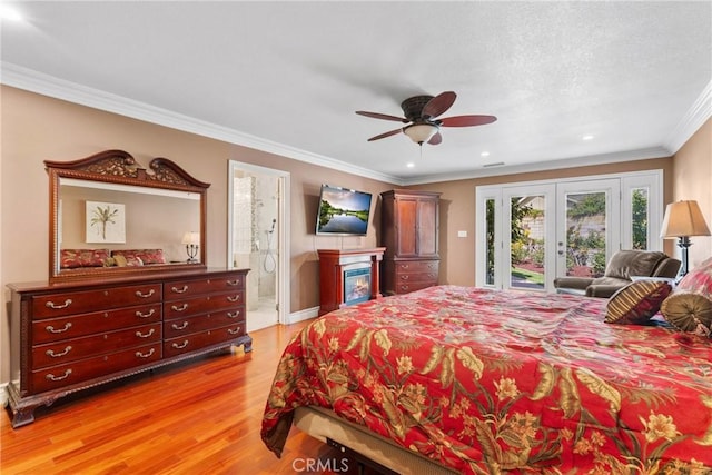 bedroom with access to exterior, french doors, light wood-style floors, ensuite bath, and crown molding