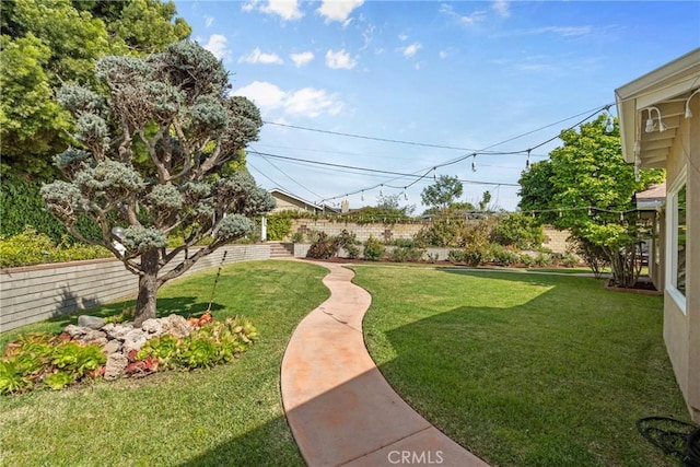 view of yard with fence