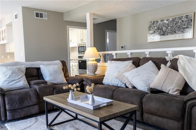6151 Tyndall Dr, Huntington Beach, CA 92647 - living area with a textured ceiling