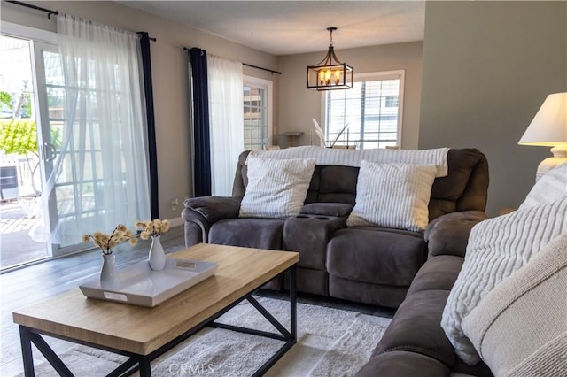 6151 Tyndall Dr, Huntington Beach, CA 92647 - living area with a chandelier and wood finished floors