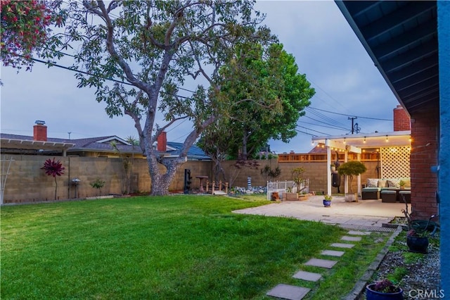 6151 Tyndall Dr, Huntington Beach, CA 92647 - view of yard with a patio and an outdoor living space