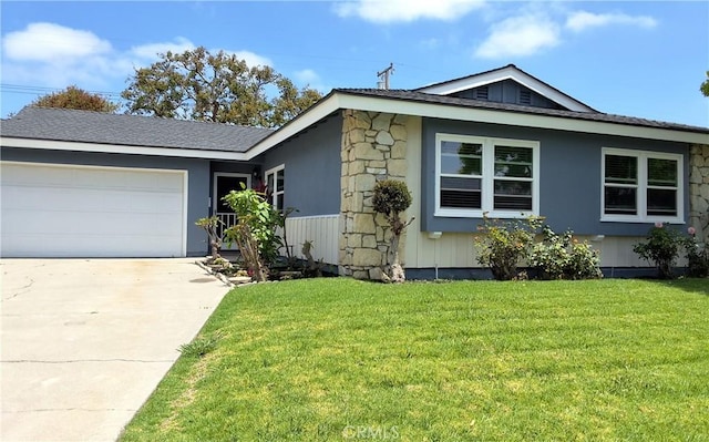 6151 Tyndall Dr, Huntington Beach, CA 92647 - view of front facade with concrete driveway, a front lawn, an attached garage, and stone siding