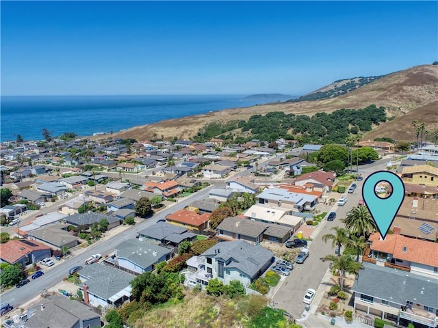 bird's eye view featuring a residential view and a water view
