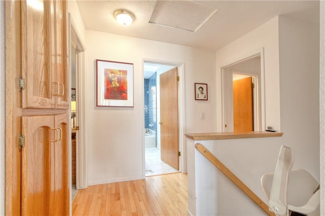 corridor featuring light wood-style floors