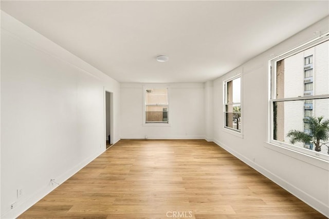 455 E Ocean Blvd Unit 411, Long Beach, CA 90802 - unfurnished room featuring light wood-style flooring and baseboards