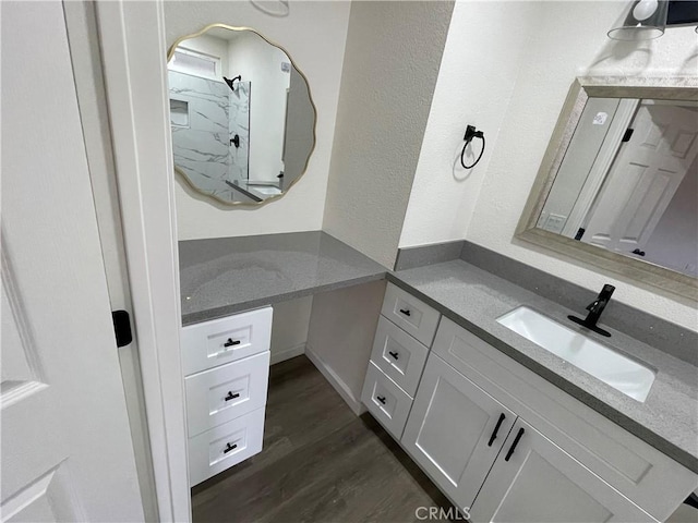 13749 Dahl Way, Moreno Valley, CA 92553 - bathroom featuring wood finished floors and vanity