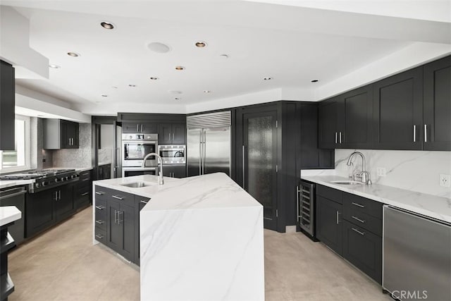 33961 Granada Dr, Dana Point, CA 92629 - kitchen featuring built in appliances, wine cooler, dark cabinets, and recessed lighting
